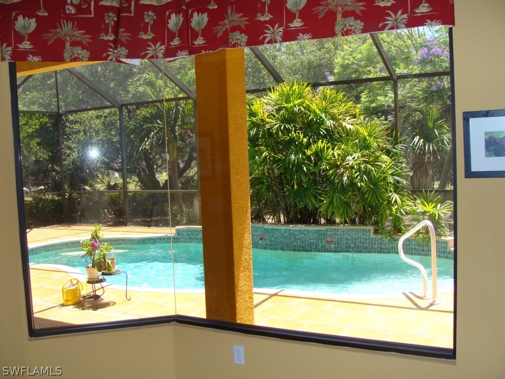 13710 Robert Road Bokeelia, FL 33922 - Photo 7 of 24 a view of a room with a large window