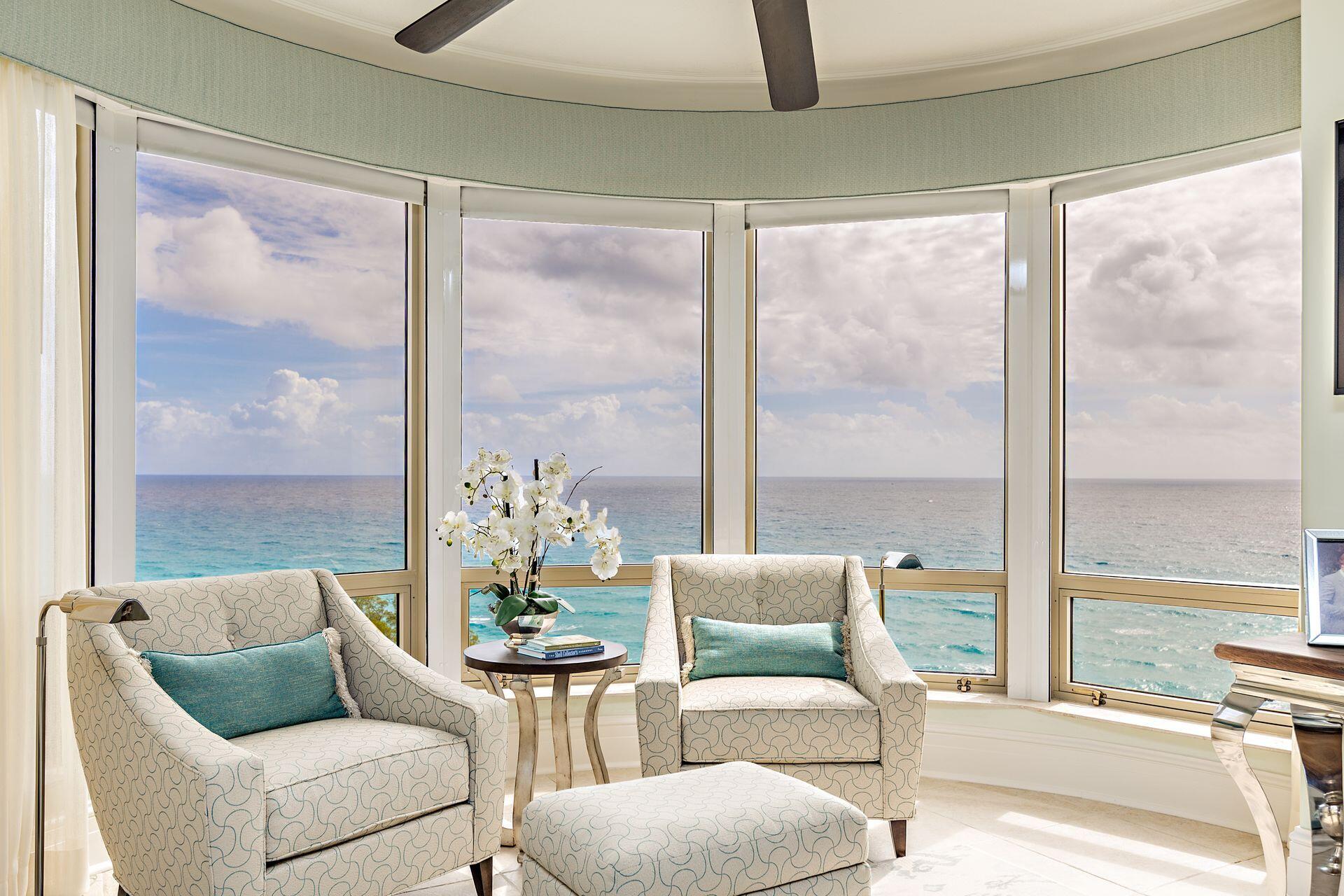 3920 North Ocean Drive, Unit 11B Singer Island, FL 33404 - Photo 24 of 58 a living room with furniture and a large window