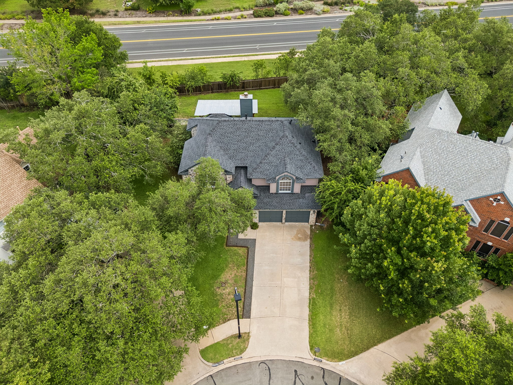 10400 O'Rourk Lane Austin, TX 78739 - Photo 33 of 33 an aerial view of a house with swimming pool and garden