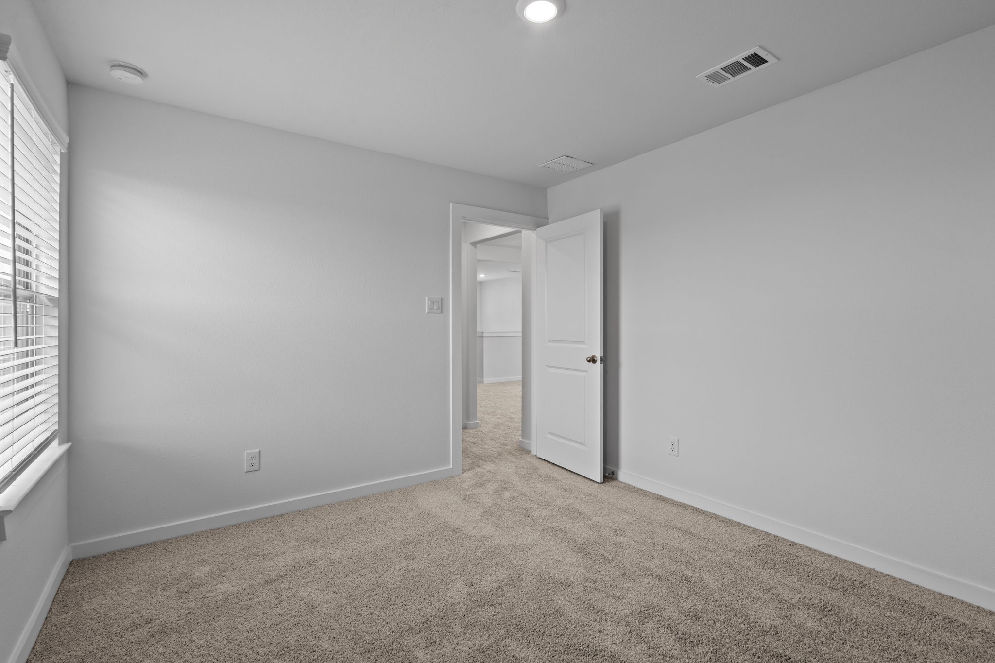 332 Gambels Quail Road Waller, TX 77484 - Photo 18 of 27 a view of an empty room