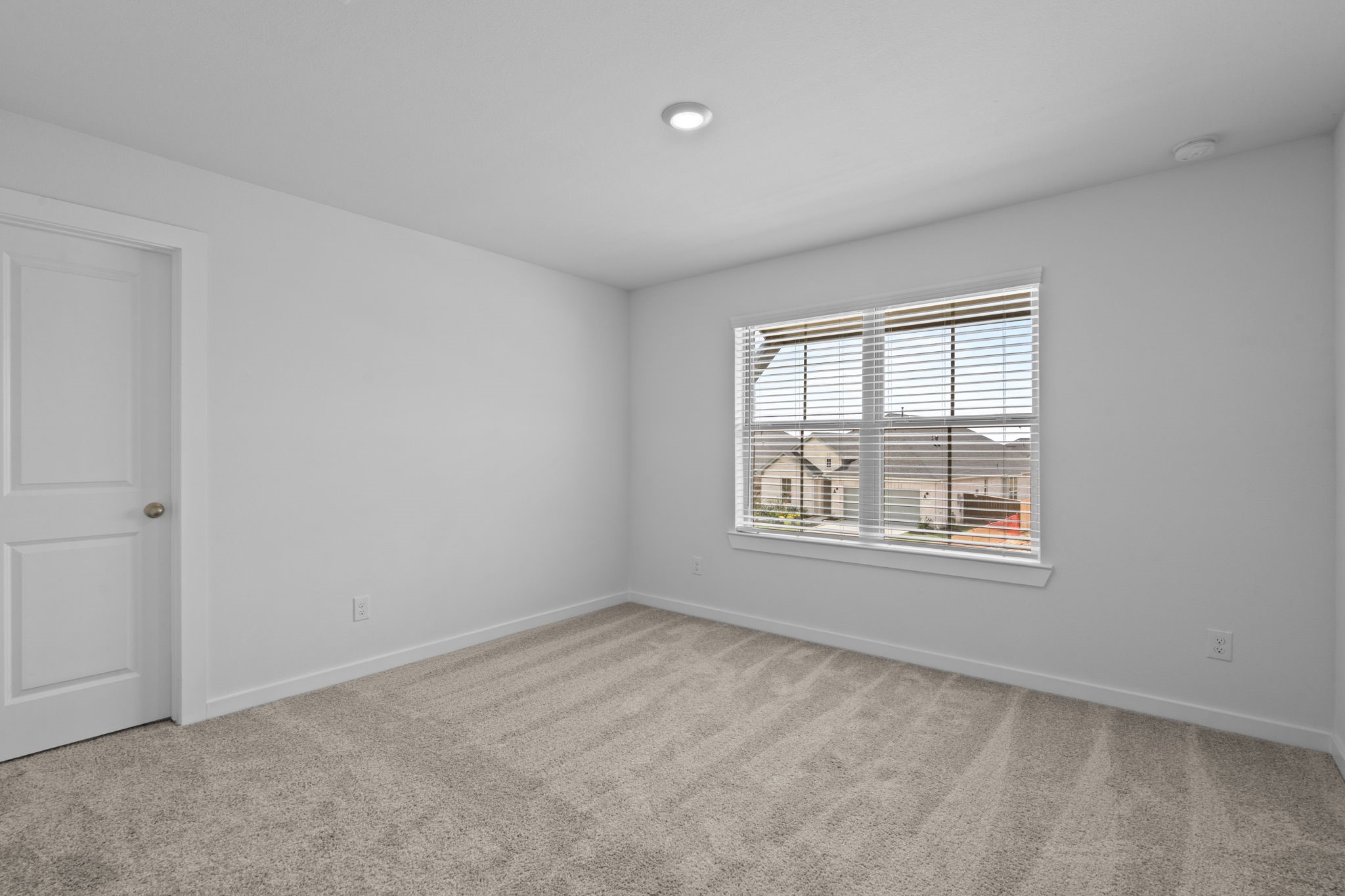 332 Gambels Quail Road Waller, TX 77484 - Photo 20 of 27 an empty room with windows