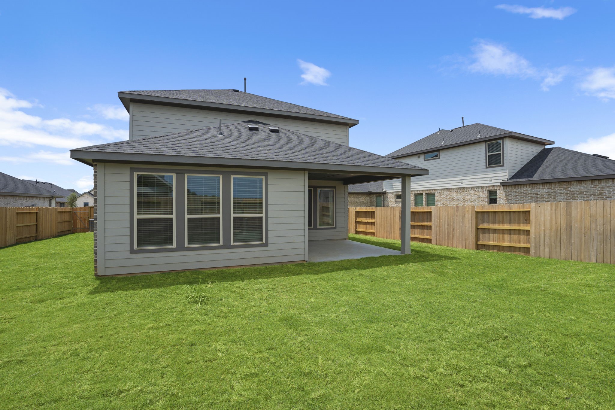 332 Gambels Quail Road Waller, TX 77484 - Photo 27 of 27 a view of a house with a yard