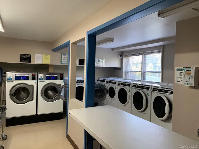 a view of a closet with shelf