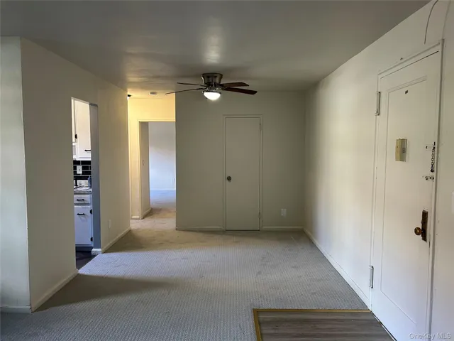 a kitchen with wooden cabinets and a stove top oven