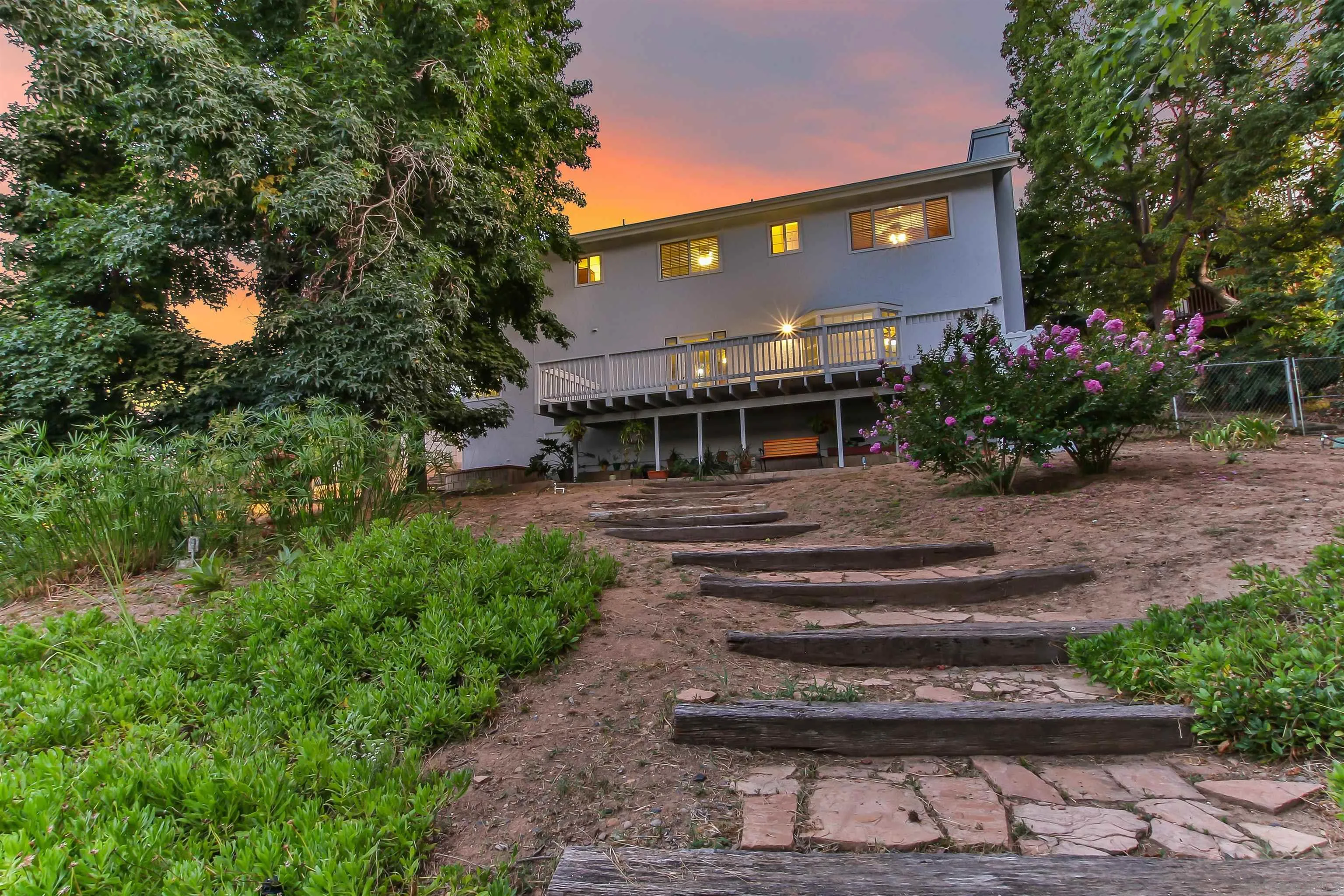 648 Norwynn Lane Fallbrook, CA 92028 - Photo 2 of 17 a front view of a house with a garden