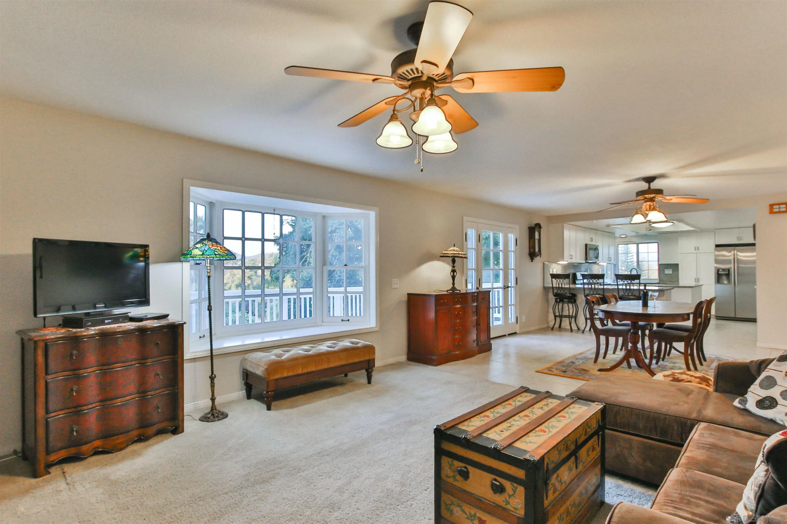 648 Norwynn Lane Fallbrook, CA 92028 - Photo 8 of 17 a living room with furniture and a flat screen tv