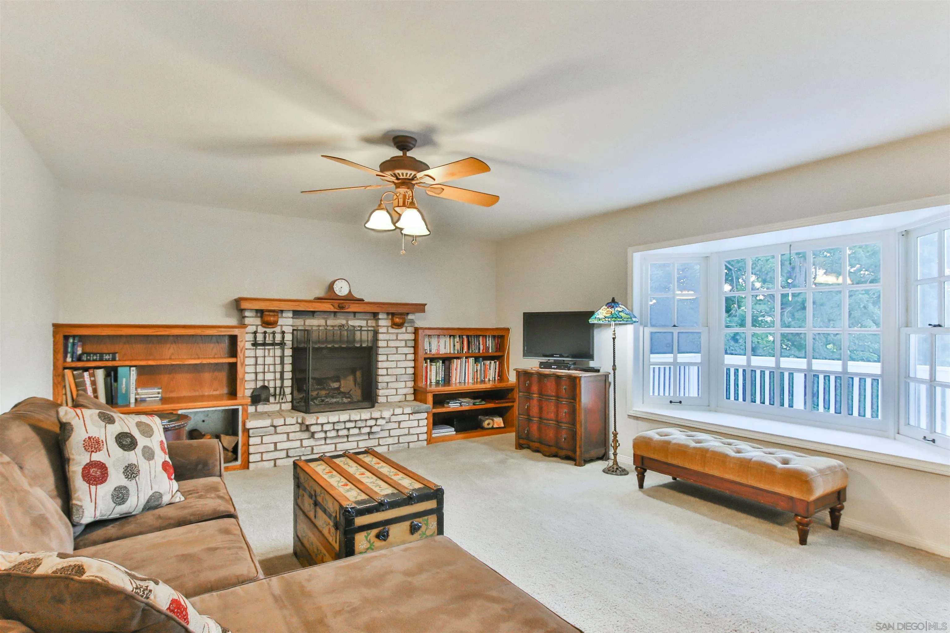 648 Norwynn Lane Fallbrook, CA 92028 - Photo 9 of 17 a living room with furniture and a flat screen tv