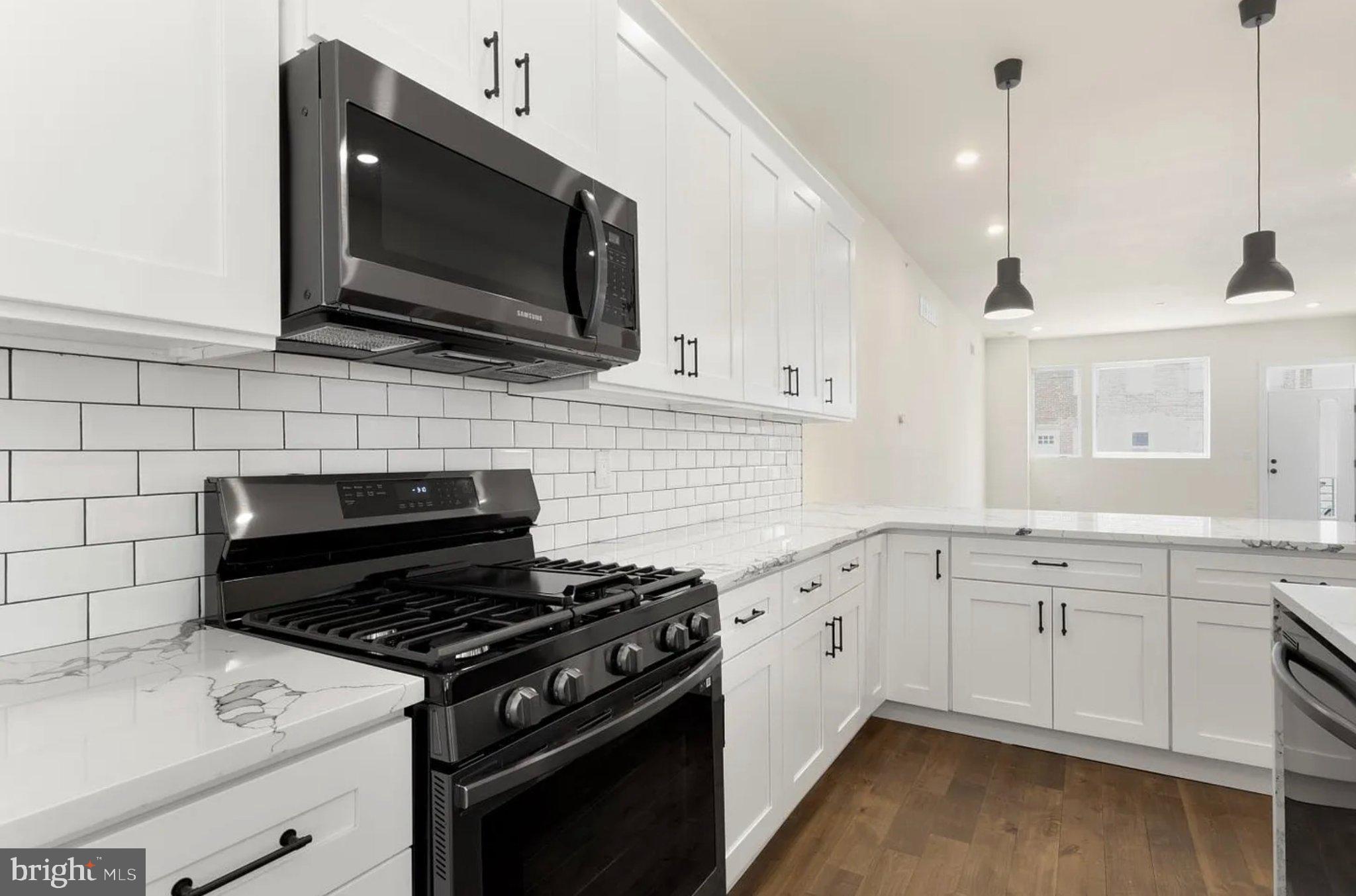 2719 Lefevre Street Philadelphia, PA 19137 - Photo 8 of 33 Sleek modern kitchen with elegance.