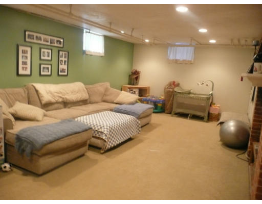 11 White Road Wayland, MA 01778 - Photo 12 of 18 a living room with furniture and a couch