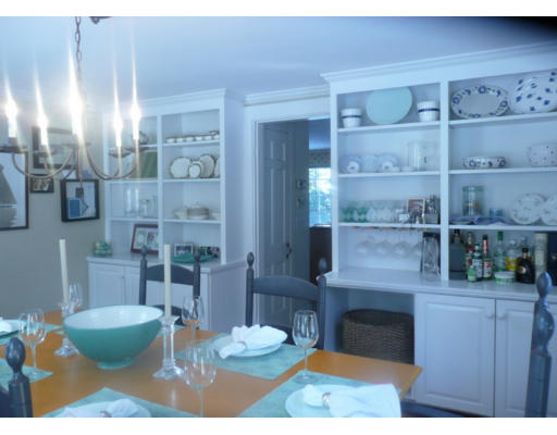 11 White Road Wayland, MA 01778 - Photo 14 of 18 a living room with furniture a rug and kitchen view