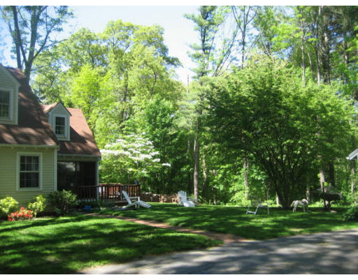 11 White Road Wayland, MA 01778 - Photo 16 of 18 a front view of a house with a yard