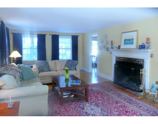 11 White Road Wayland, MA 01778 - Photo 3 of 18 a living room with furniture and a fireplace