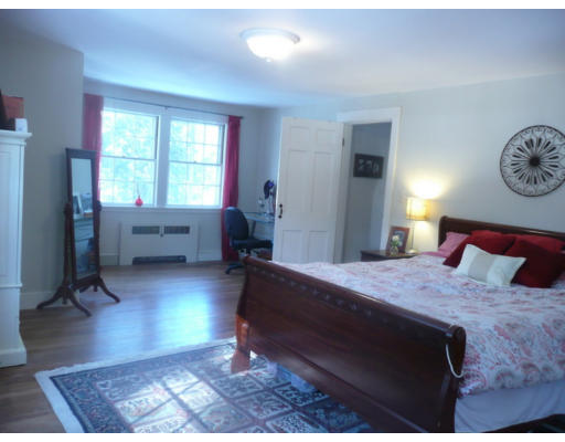 11 White Road Wayland, MA 01778 - Photo 9 of 18 a bed room with a bed and a couch