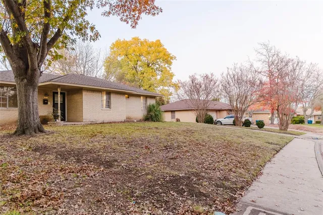 a bathroom with a shower and a toilet