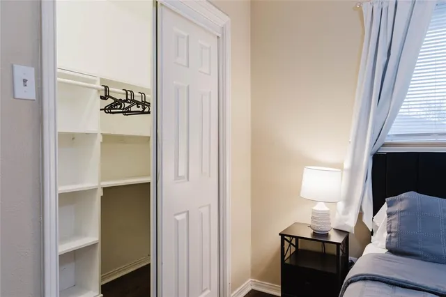 a view of a house with a snow on the road