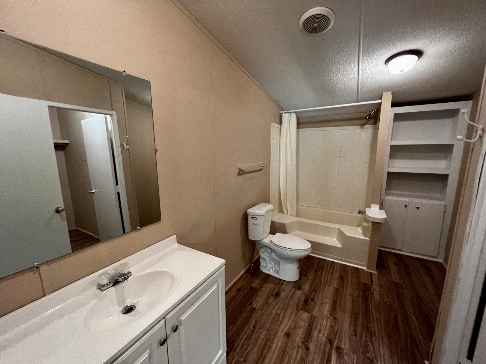 2979 Quarry Road Mount Juliet, TN 37122 - Photo 11 of 23 a bathroom with a sink a toilet a mirror and shower