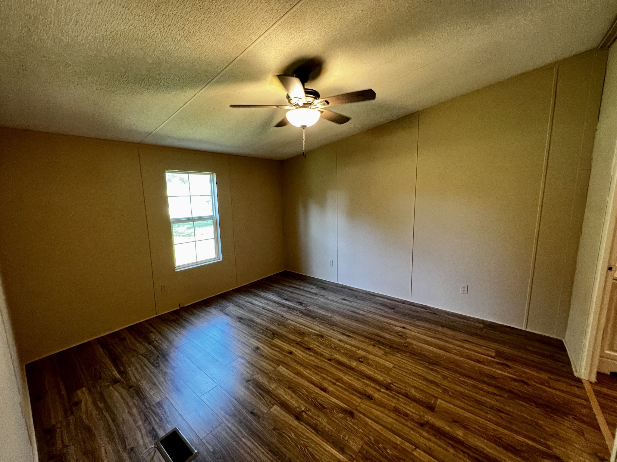 2979 Quarry Road Mount Juliet, TN 37122 - Photo 12 of 23 a view of an empty room with window and wooden floor