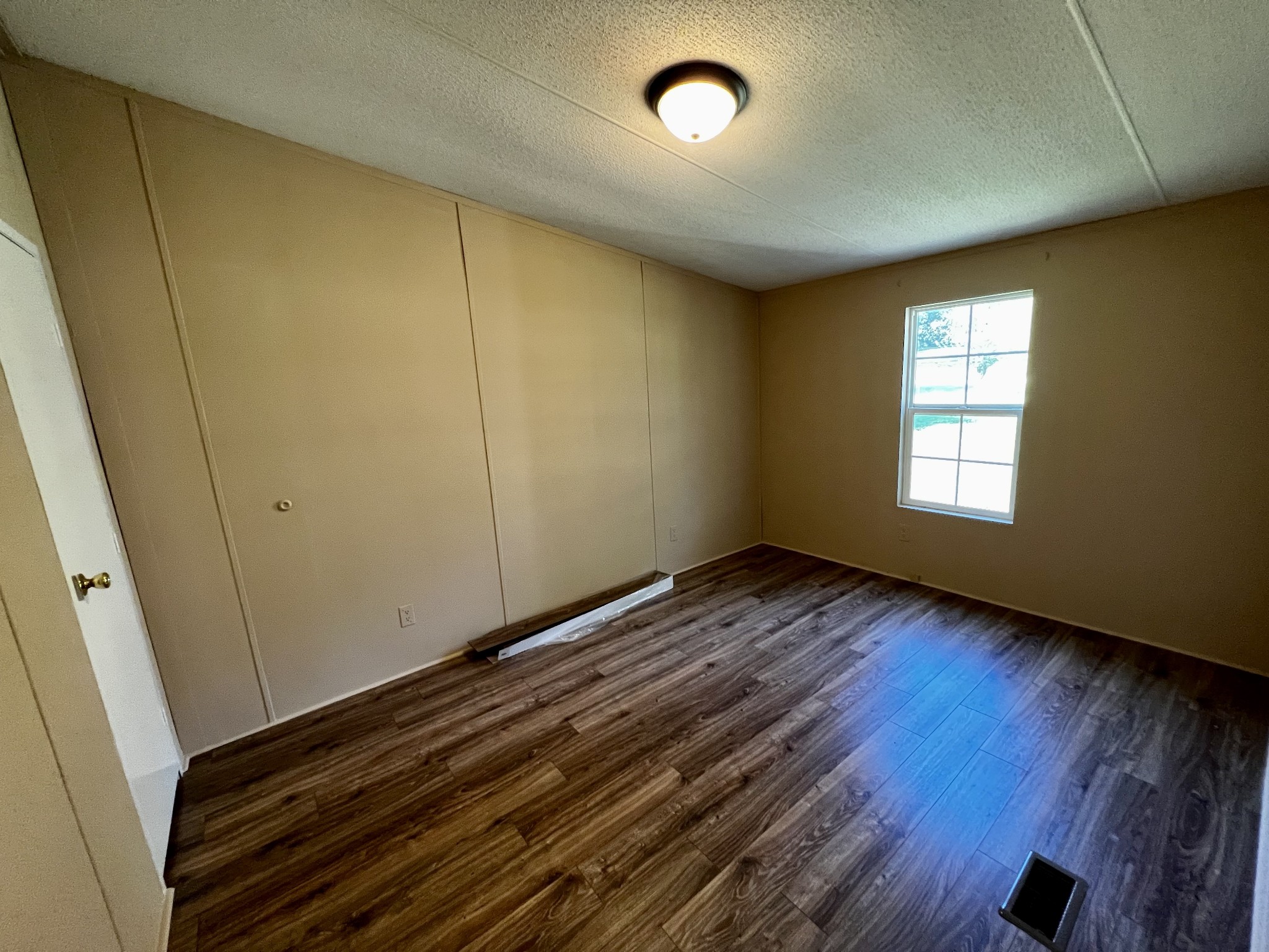 2979 Quarry Road Mount Juliet, TN 37122 - Photo 14 of 23 an empty room with wooden floor and windows