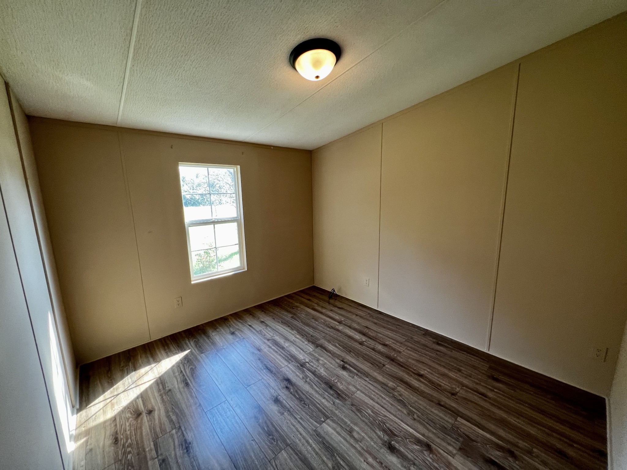 2979 Quarry Road Mount Juliet, TN 37122 - Photo 15 of 23 a view of an empty room with window and wooden floor