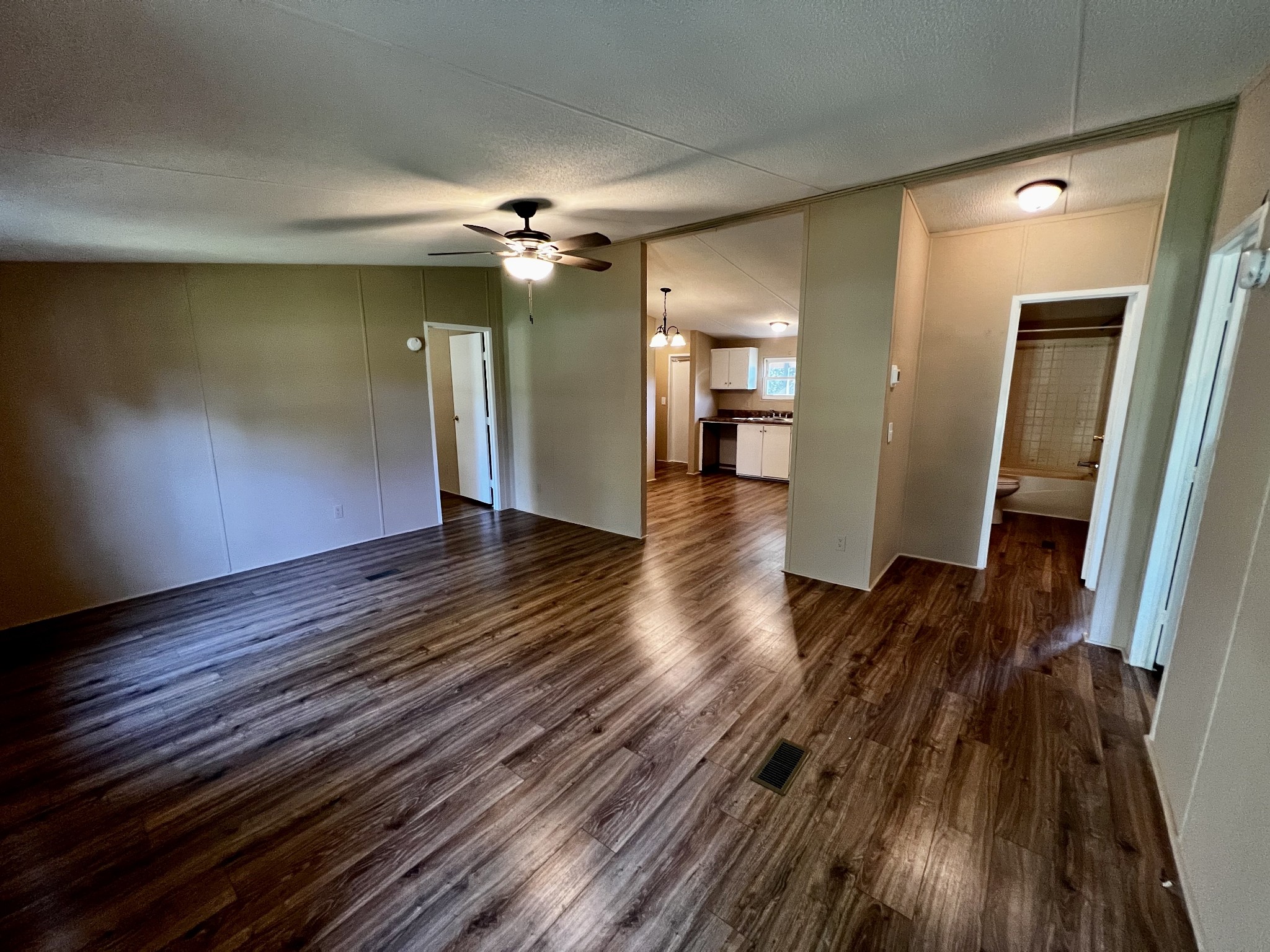 2979 Quarry Road Mount Juliet, TN 37122 - Photo 4 of 23 wooden floor in an empty room with a window