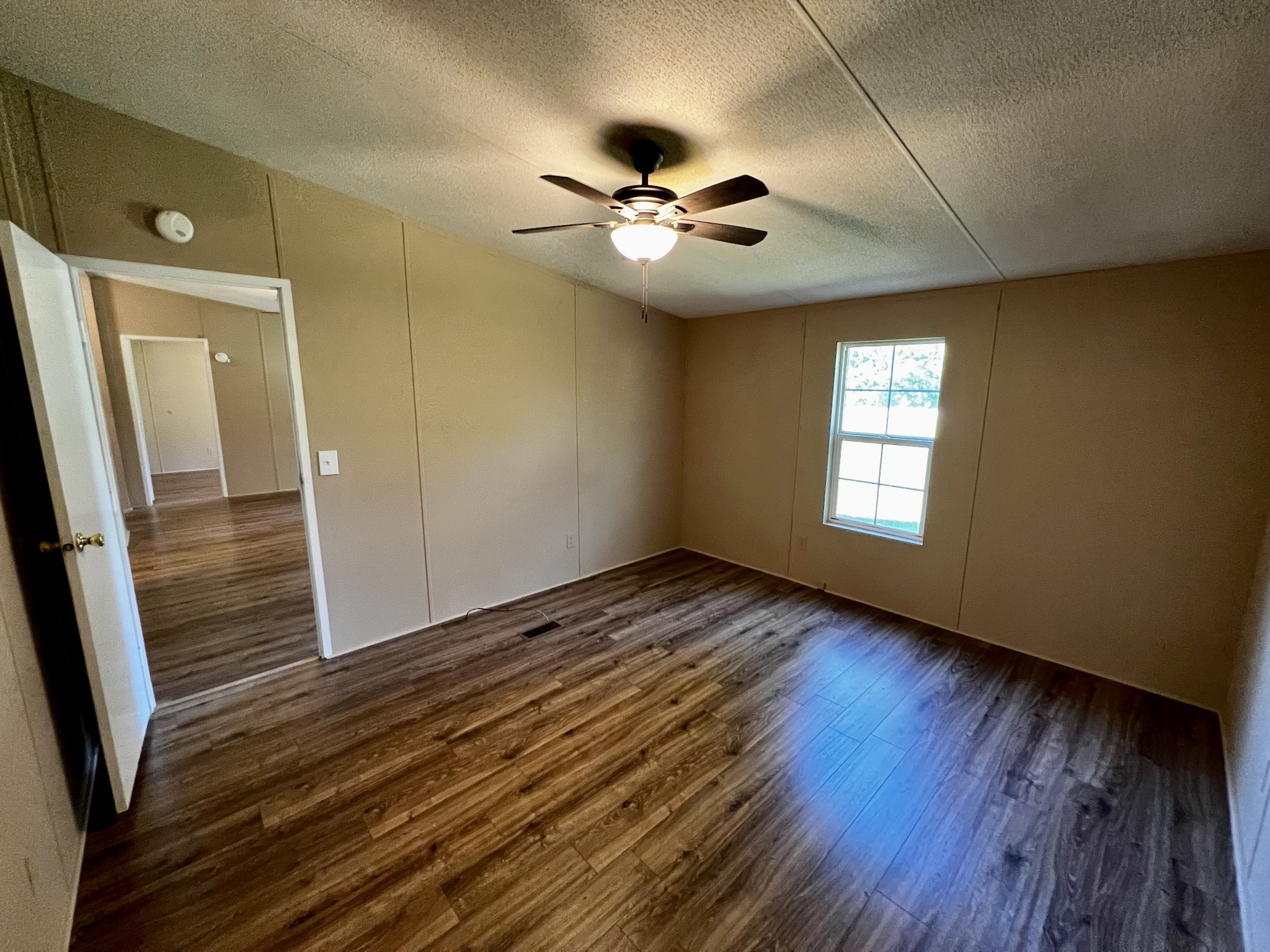 2979 Quarry Road Mount Juliet, TN 37122 - Photo 9 of 23 wooden floor in an empty room with a window