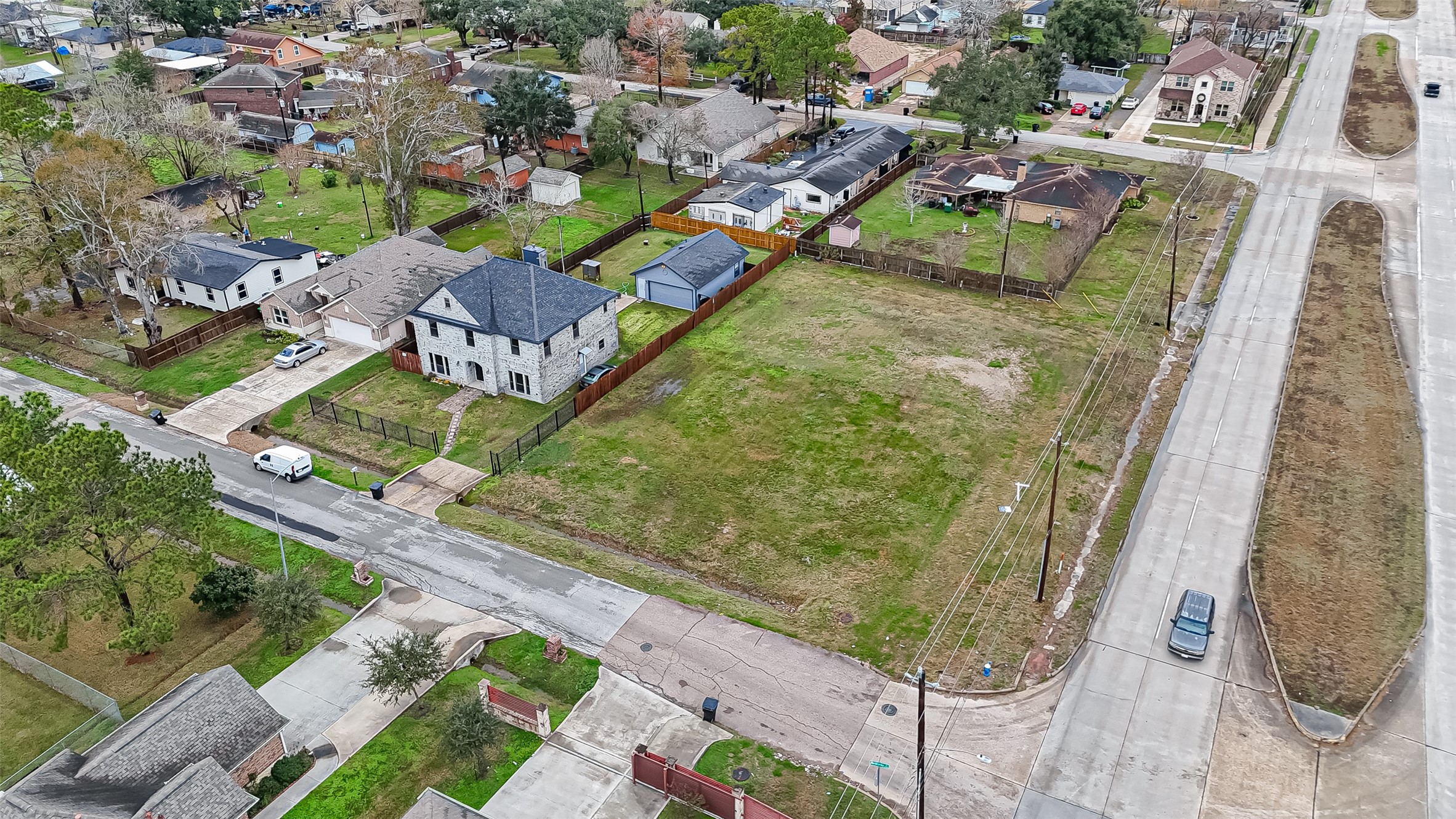 0 Wetherby Lane Houston, TX 77075 - Photo 4 of 11 an aerial view of residential houses with outdoor space
