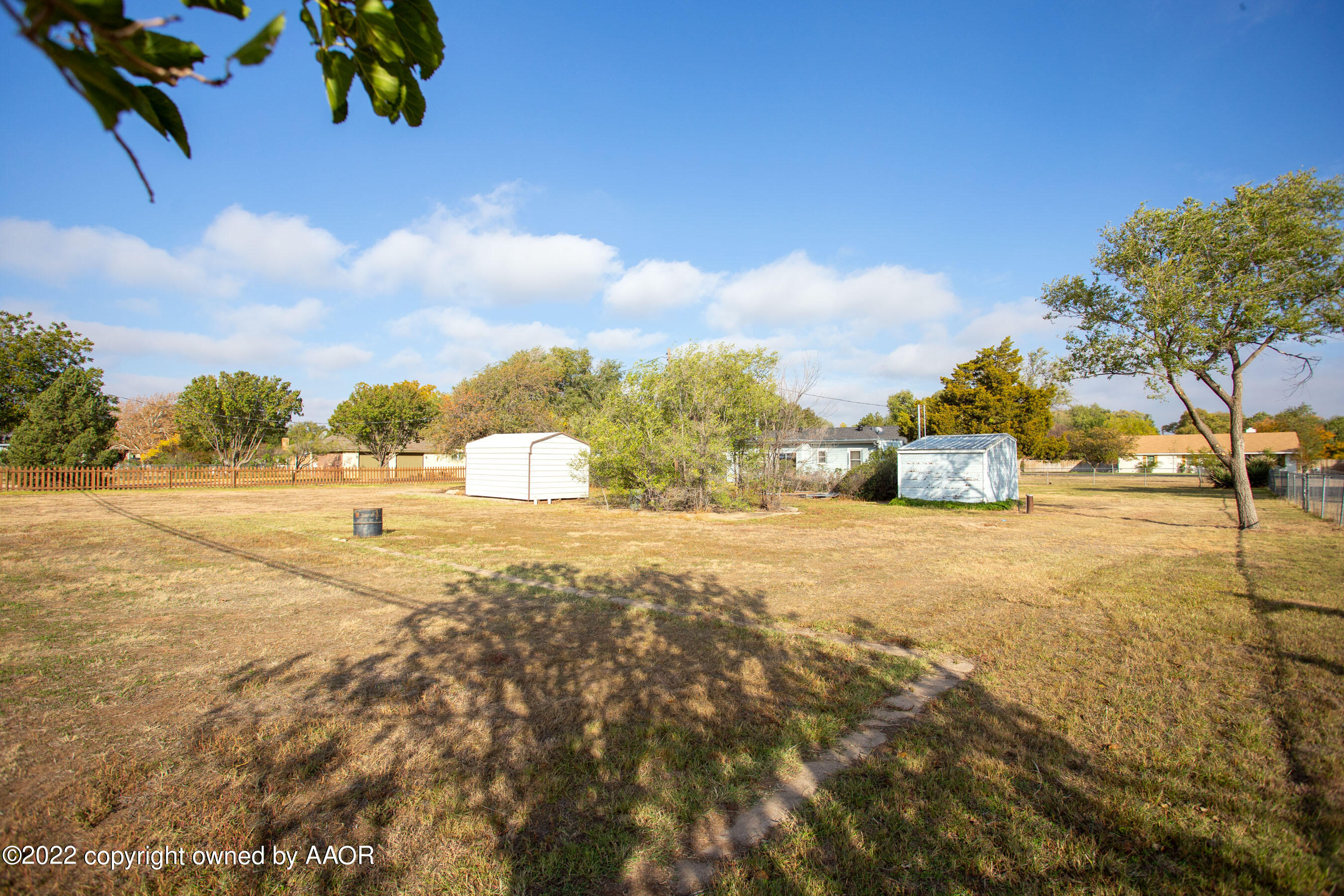 4819 Arden Road Amarillo, TX 79110 - Photo 26 of 33 a view of road with large trees