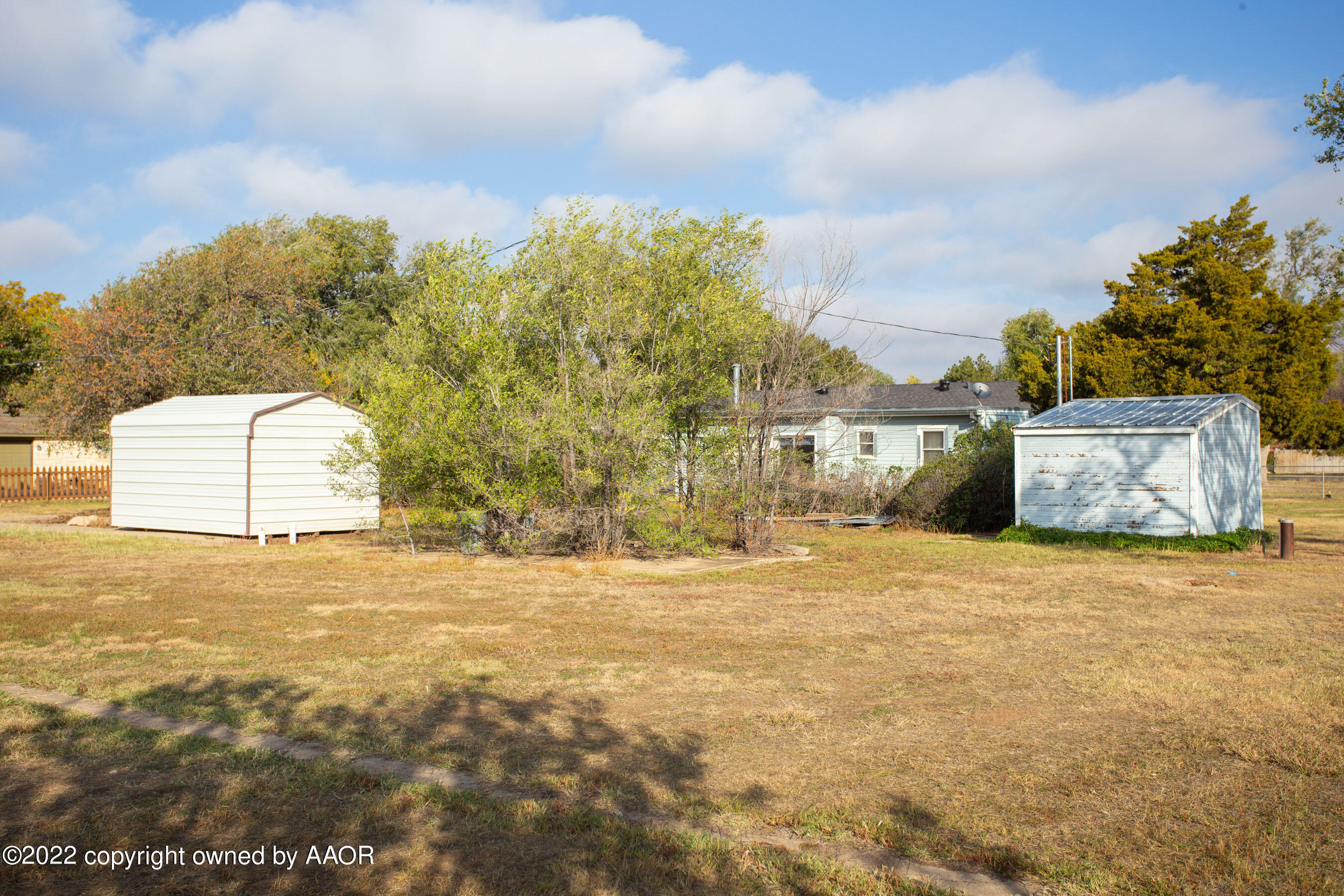 4819 Arden Road Amarillo, TX 79110 - Photo 28 of 33 a big yard with road and trees