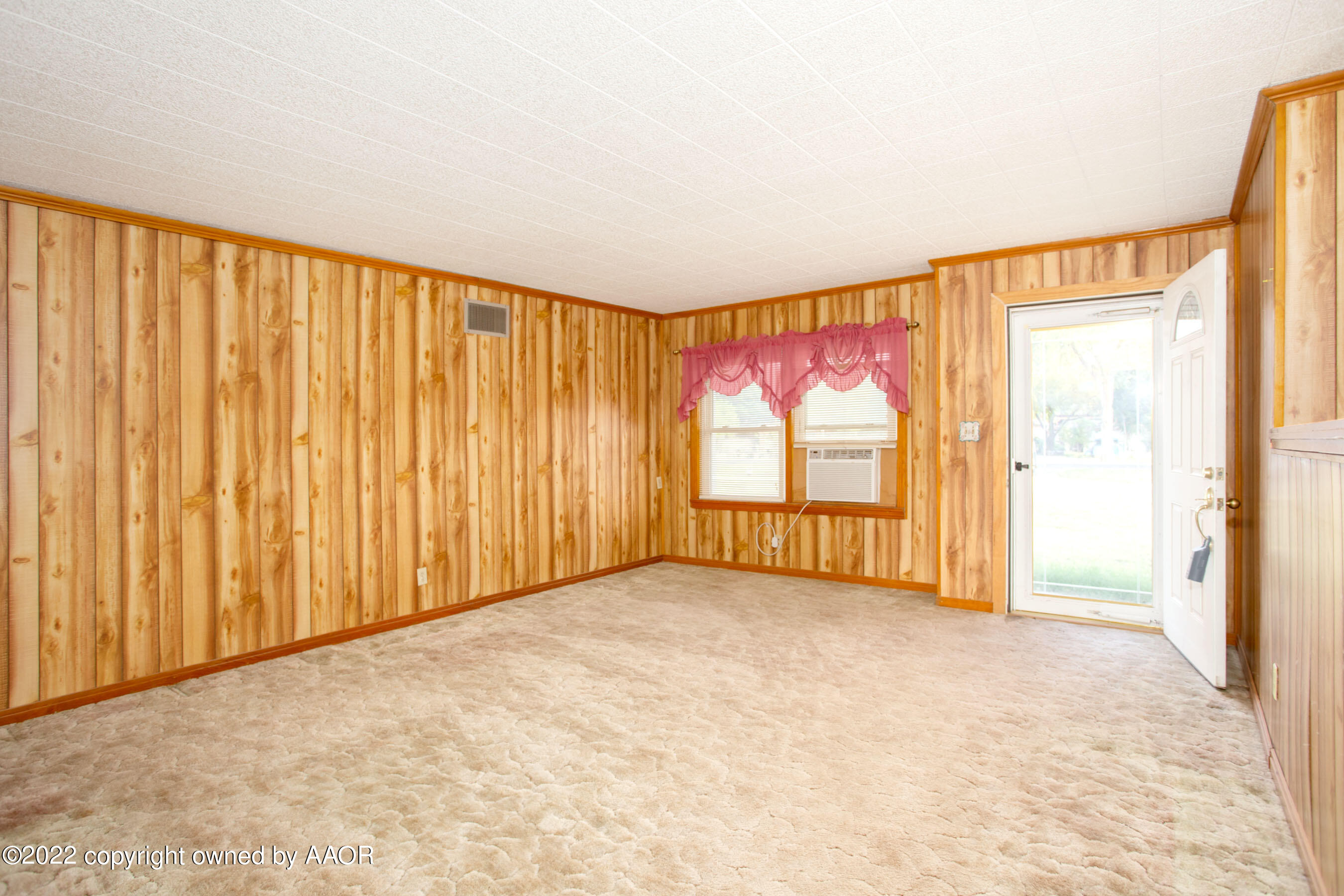 4819 Arden Road Amarillo, TX 79110 - Photo 4 of 33 a view of an empty room with a window