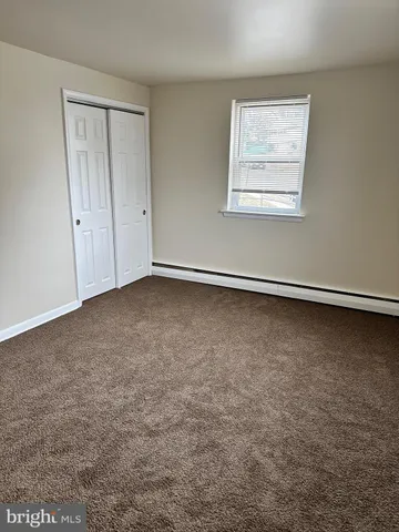 an empty room with a workbench