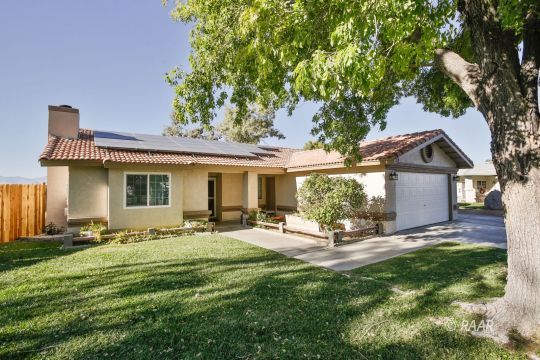 424 Mavis Court Ridgecrest, CA 93555 - Photo 2 of 32 a front view of house with yard outdoor seating and green space