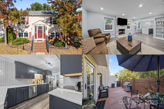 a view of a patio with couches table and chairs under an umbrella with a fire pit