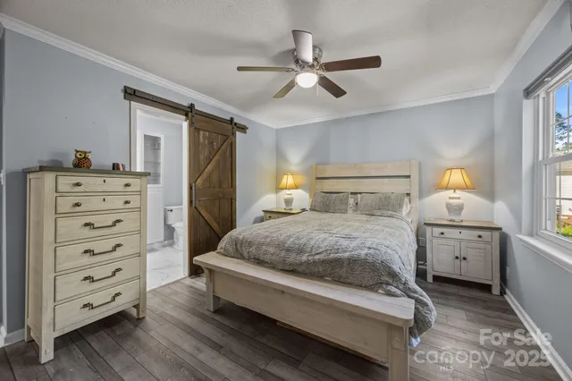 a bedroom with a bed and a closet