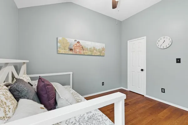 a bed room with a bed and a window