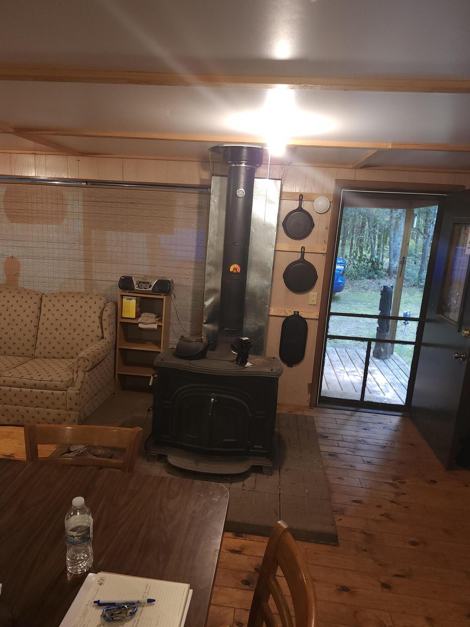 6909 North Lone Elk Road Irons, MI 49644 - Photo 3 of 16 cabin fireplace - Copy - Copy - Copy