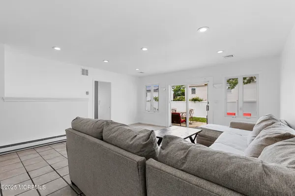 a living room with furniture and a couch