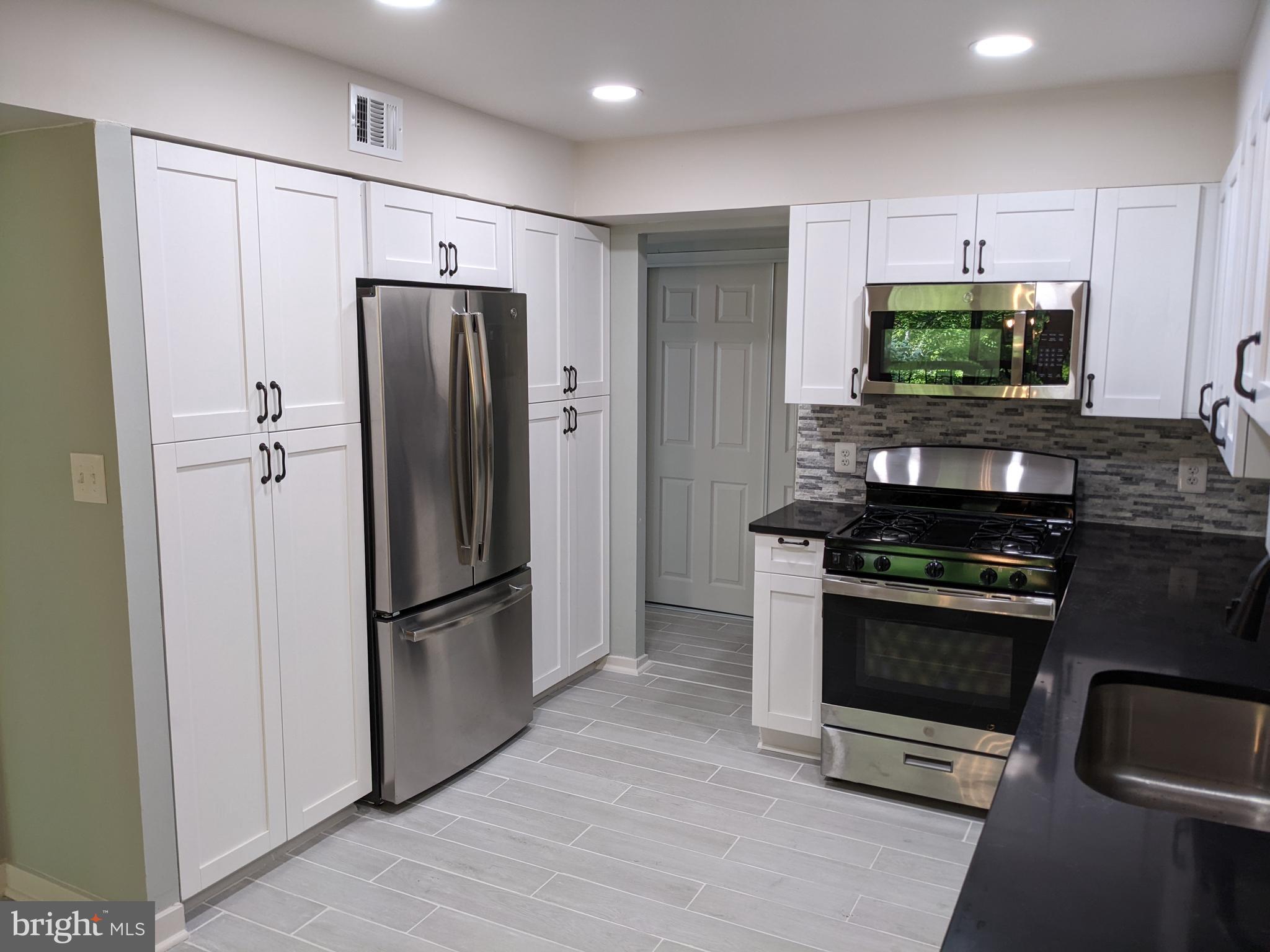 5727 Harpers Farm Road, Unit F Columbia, MD 21044 - Photo 7 of 57 Kitchen View