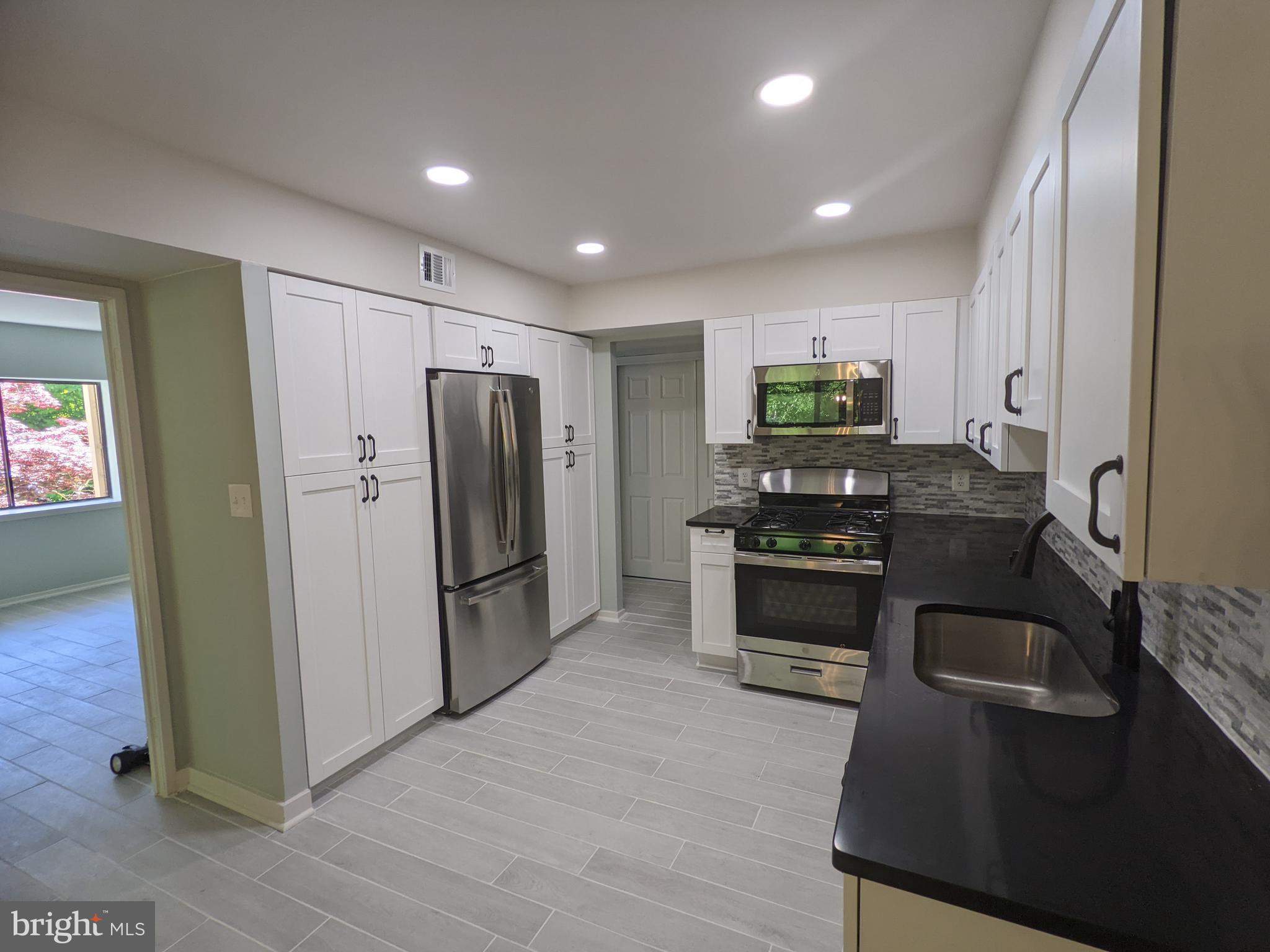 5727 Harpers Farm Road, Unit F Columbia, MD 21044 - Photo 10 of 57 Kitchen View