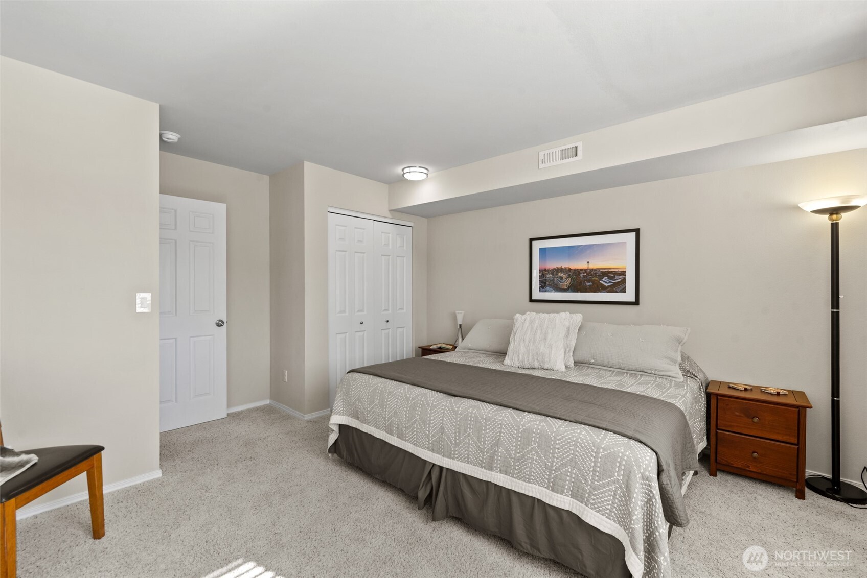 204 Stehekin Way Chelan, WA 98816 - Photo 25 of 40 a bedroom with a bed and a night stand