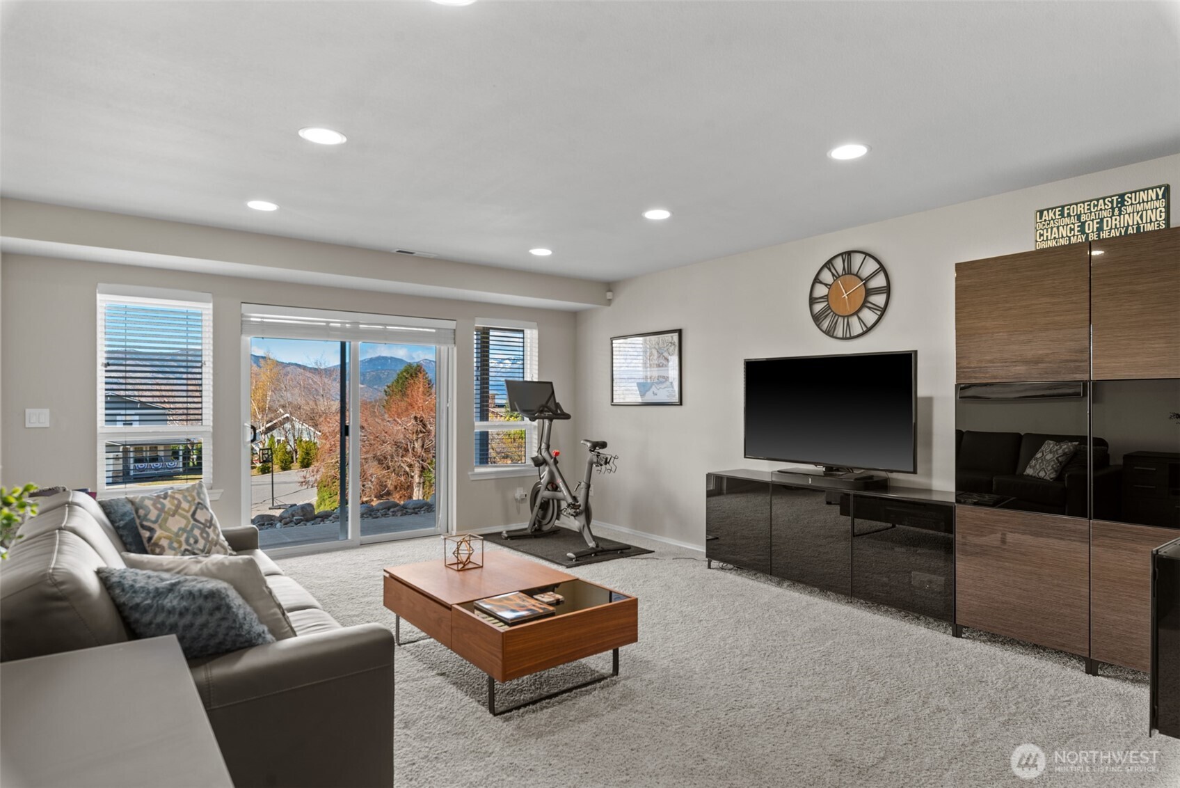 204 Stehekin Way Chelan, WA 98816 - Photo 27 of 40 a living room with furniture and a flat screen tv