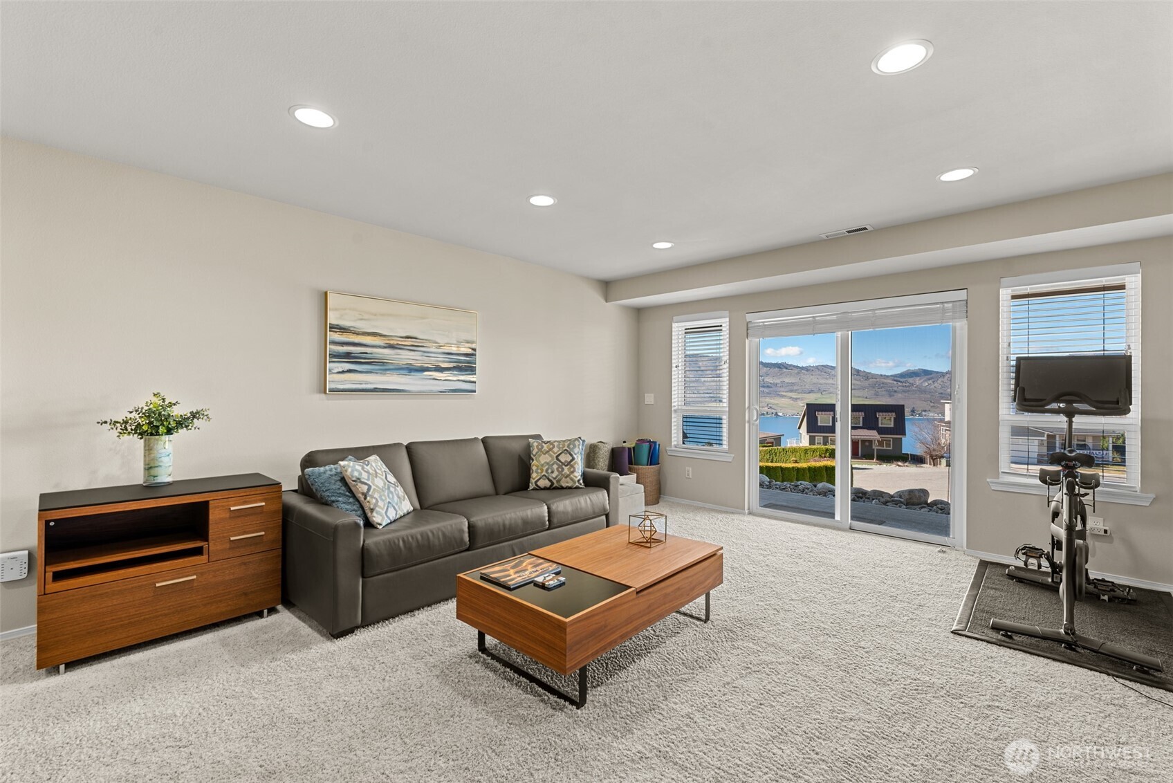 204 Stehekin Way Chelan, WA 98816 - Photo 28 of 40 a living room with furniture and a flat screen tv