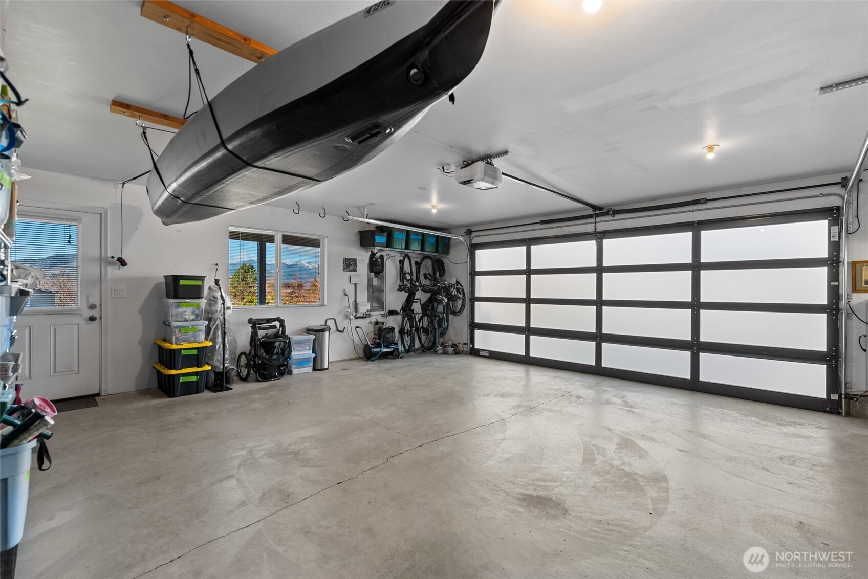 204 Stehekin Way Chelan, WA 98816 - Photo 29 of 40 a view of a garage with furniture and a garage