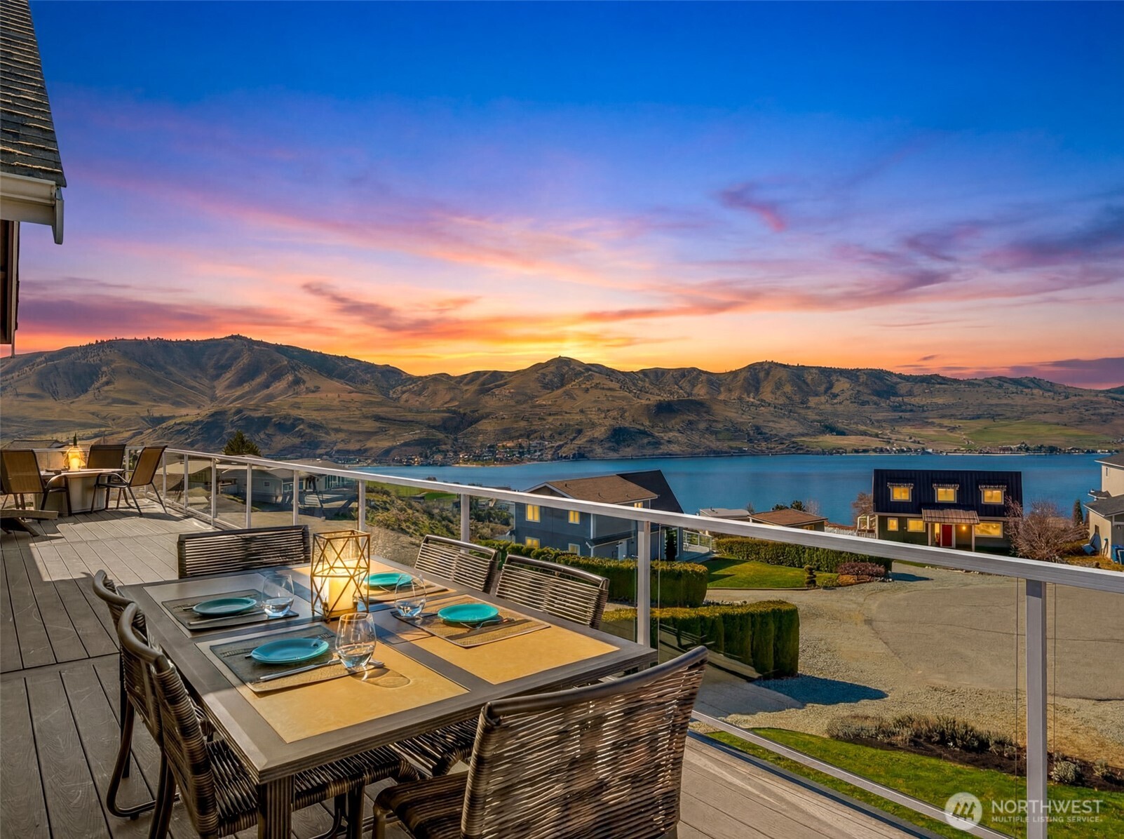 204 Stehekin Way Chelan, WA 98816 - Photo 32 of 40 a view of a chairs and table on the terrace