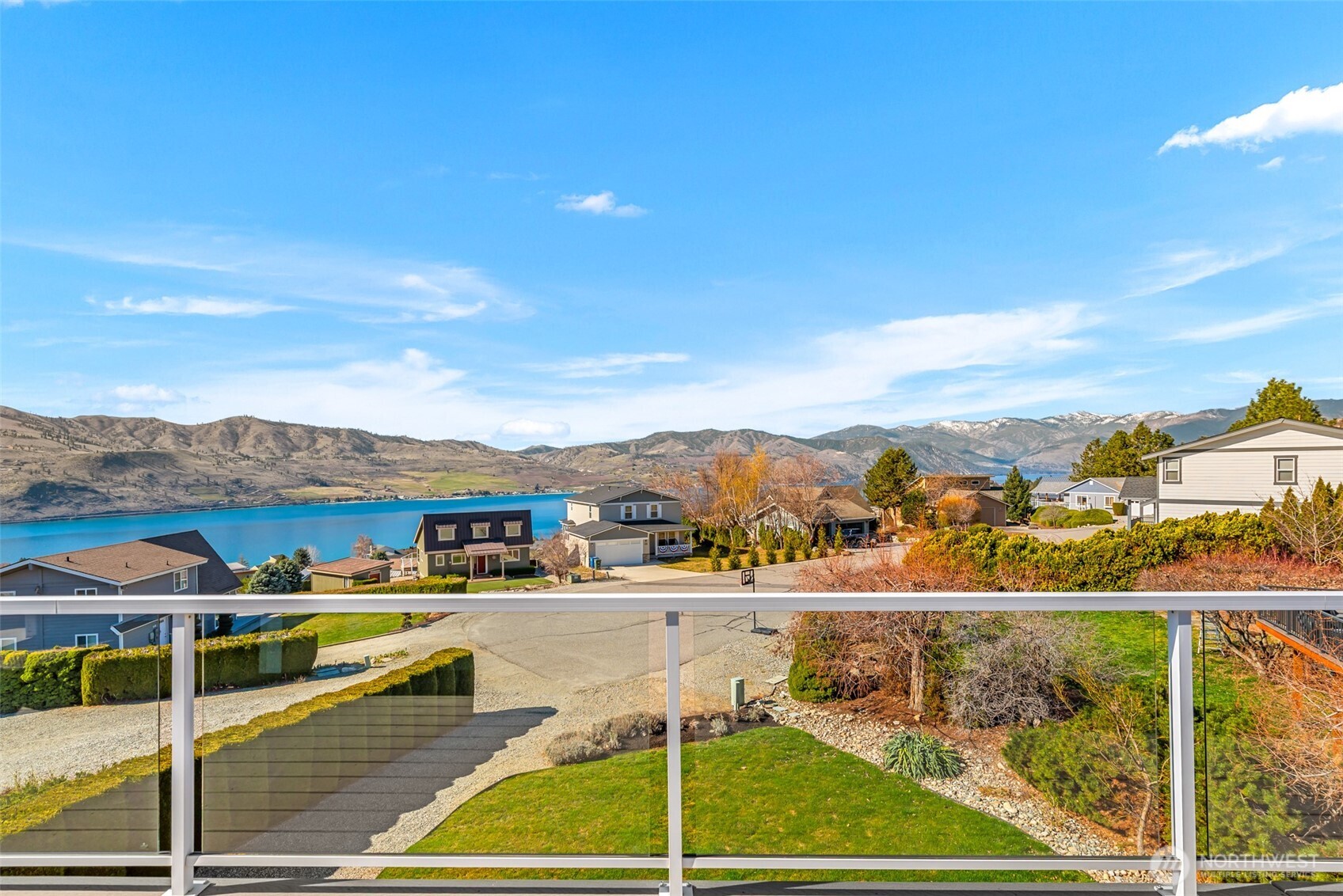 204 Stehekin Way Chelan, WA 98816 - Photo 33 of 40 a view of a swimming pool with lawn chairs
