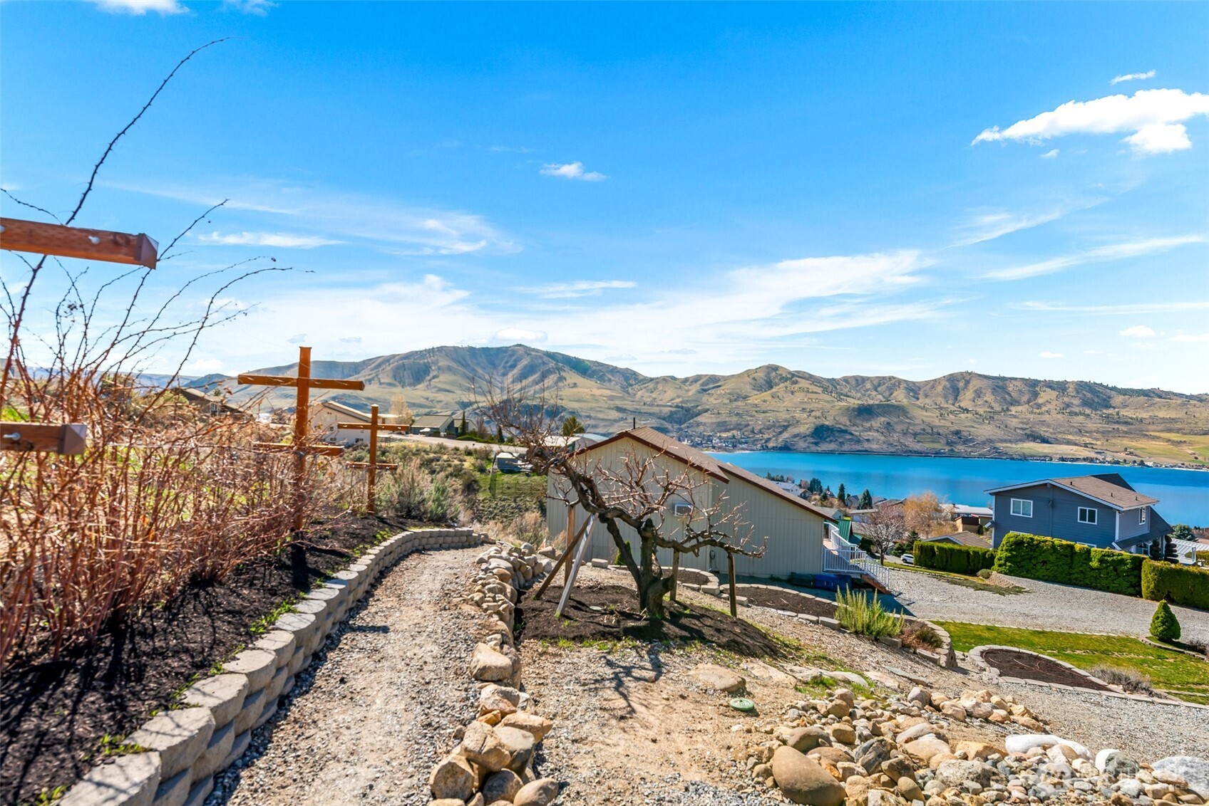 204 Stehekin Way Chelan, WA 98816 - Photo 36 of 40 a view of a terrace with a yard
