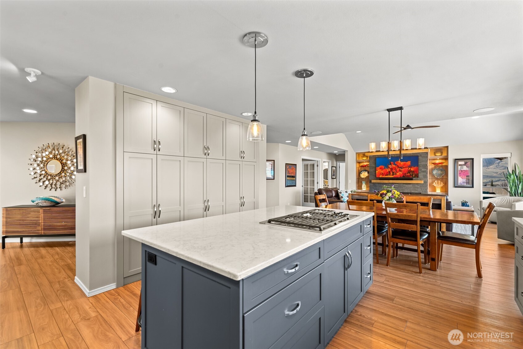 204 Stehekin Way Chelan, WA 98816 - Photo 8 of 40 a kitchen that has a lot of cabinets in it and stainless steel appliances
