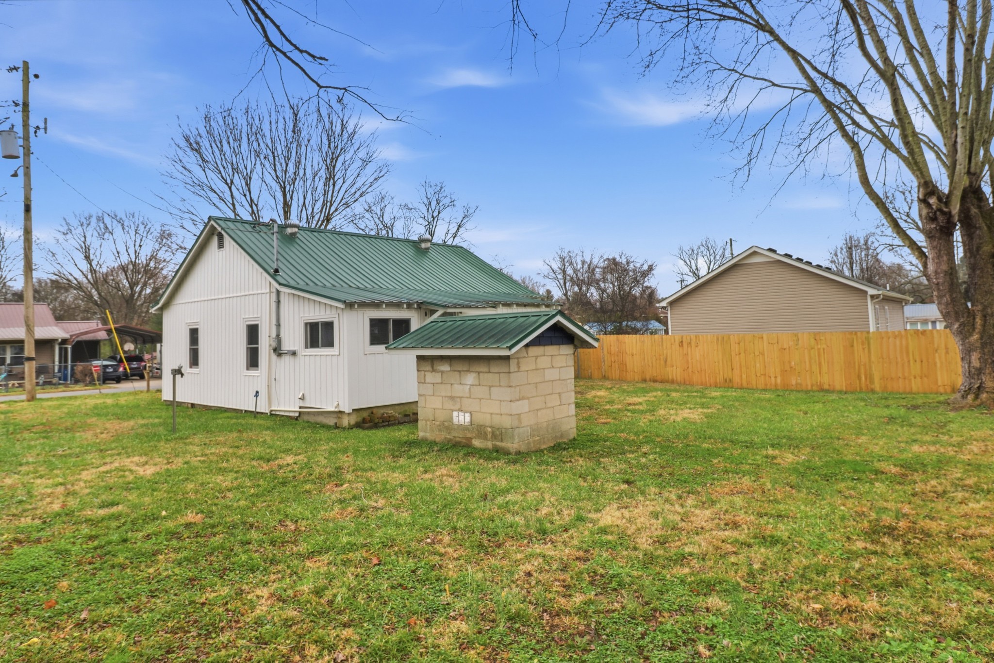 612 Maple Street Manchester, TN 37355 - Photo 20 of 20 a view of a house with a yard
