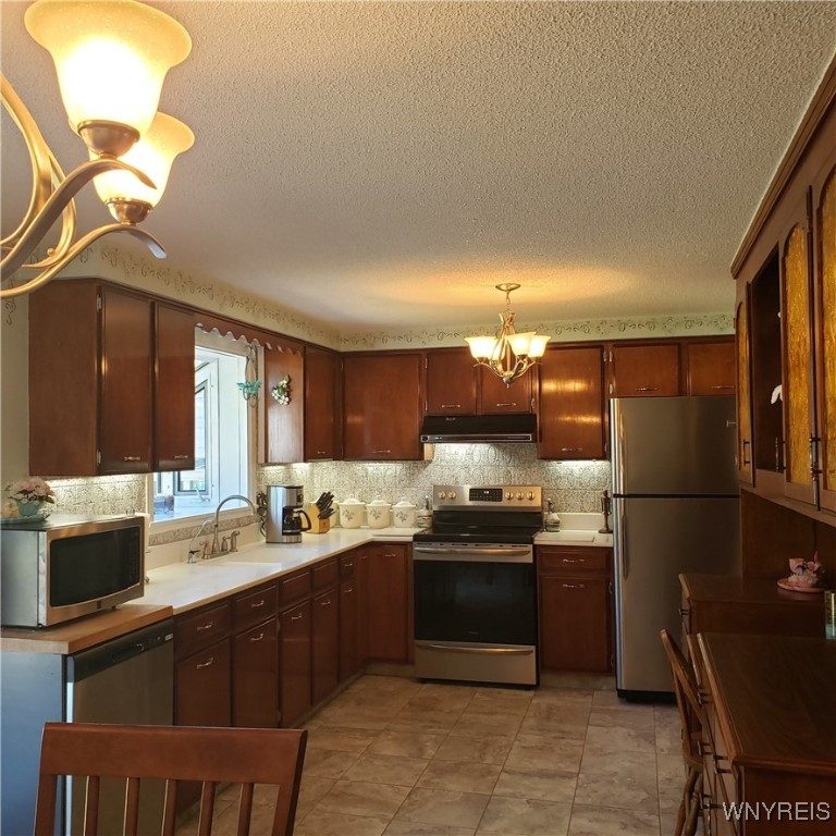 6717 Errick Road Wheatfield, NY 14120 - Photo 7 of 50 Eat in kitchen includes appliances