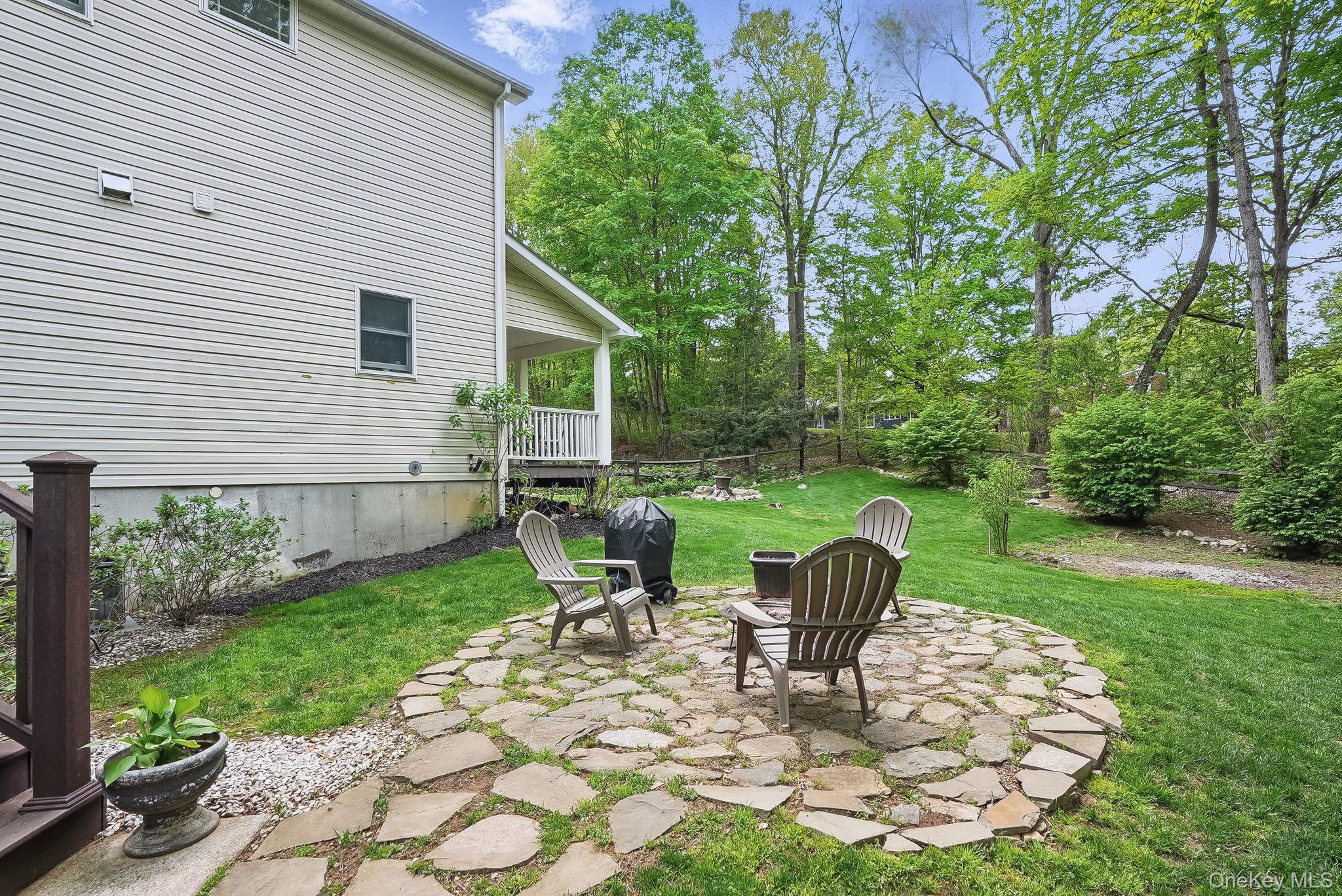 304 Church Road Putnam Valley, NY 10579 - Photo 42 of 50 View of yard featuring a patio area and a fire pit