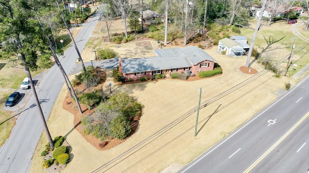 a view of a balcony with chairs